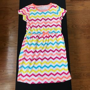 Vibrant colored striped tail dress.